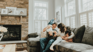 Mother and family at home representing how surrogacy supports a surrogate's family future in Virginia