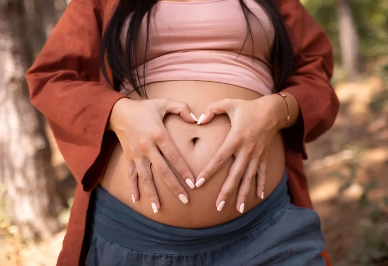 Pregnant women Making Heart